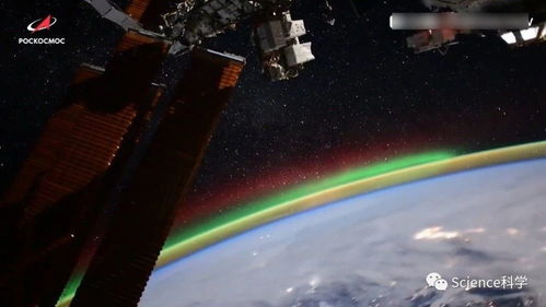 俄宇航员太空拍下北极光 银河系像正漂浮在地平线上