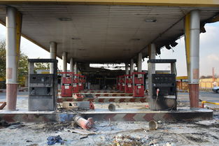 伊朗上调油价引发多地抗议 加油站被烧空 
