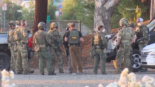 美FBI出动大批警力 突袭逮捕24岁华裔退伍兵 图