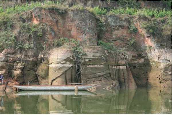 大型唐代坐佛被淹半世纪重露面,石窟专家吁勘察保护