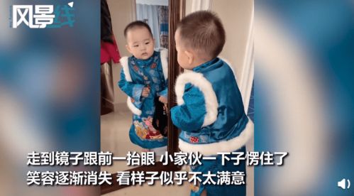 萌娃试穿新衣实力演绎买家秀,照镜子时表情亮了,网友 仿佛看见我自己