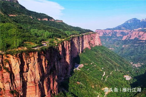 太行深处有传奇,河南13名村民,在悬崖峭壁开凿出世界第9大奇迹