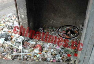 北京社区垃圾堆发现死婴 尸体脖子被刀割开 