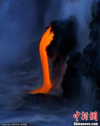 摄影师冒着生命危险拍摄基拉韦厄火山喷发场景(用生命在拍照的摄影师)