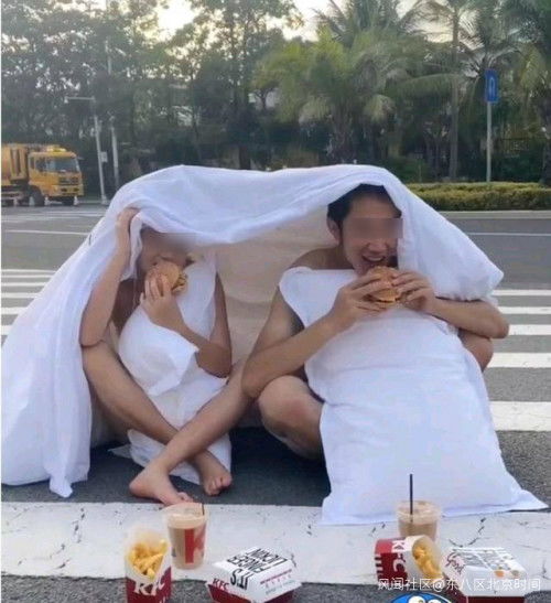 男女半裸床单躺斑马线拍婚纱照 网友炸锅