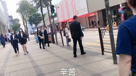 男子徒手爬200米高摩天大厦,无任何保护措施 登顶后被警方逮(男子徒手爬122米高楼)